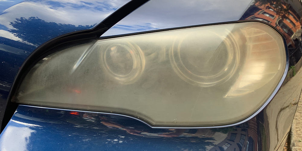 Foggy, oxidized headlight before restoration